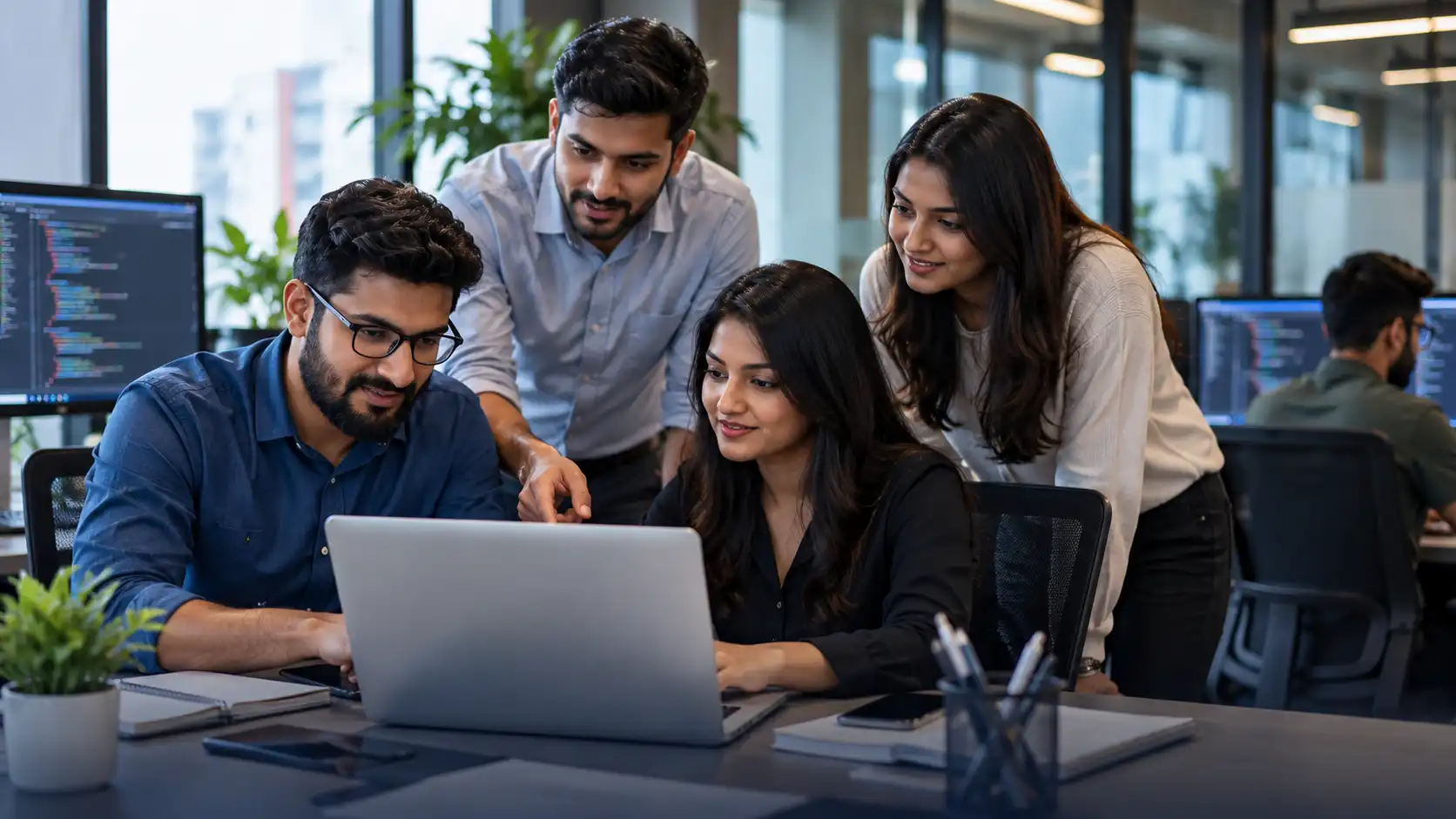 InfraWebTech team collaborating on digital solutions
